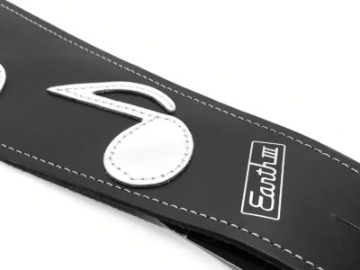 Earth 3 SRV Vaughan musical notes leather guitar strap closeup